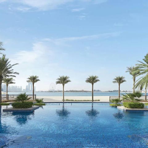 Go for a refreshing swim in the communal resort-style swimming pool