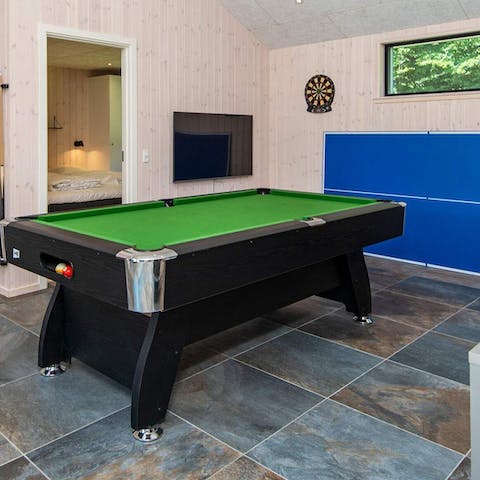 Embrace family fun with a game of table tennis, football or billiards 