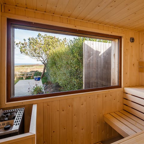 Unwind in the sauna after days on the beach 