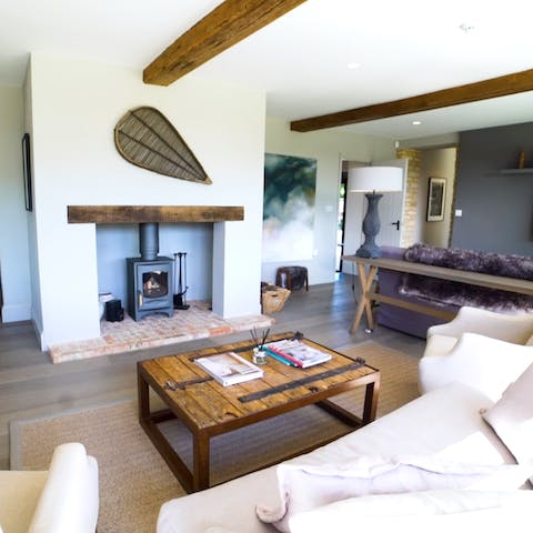 Cosy up and unwind around the wood-burning stove