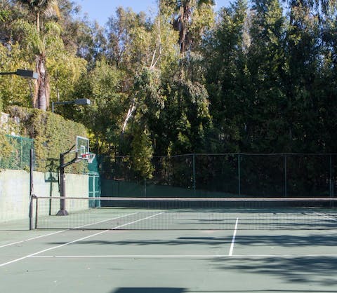Have a friendly game of tennis on the court