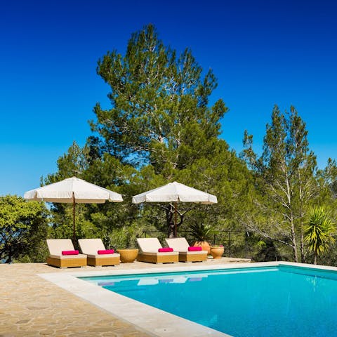 Relax on the outdoor furniture, set up daily by the pool attendant