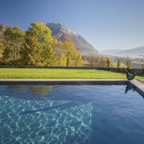 Treat yourself to a dip in the pool with views of Mont Blanc and the Alpes