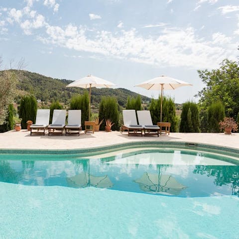 Spend relaxing days reading on a sun lounger or swimming in the private pool