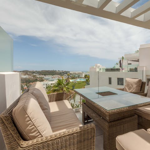 Unwind on the balcony after a day trip to Marbella