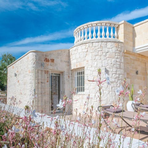Marvel at the beautiful, authentic stone exterior of the home 
