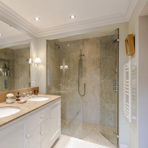 Start mornings off with a luxurious soak in the marble shower