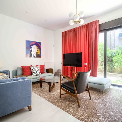 Relax in the stylish living room after a busy day at the Acropolis