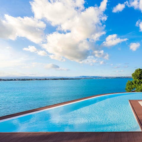 Float in the private infinity pool and take in the stunning sea views