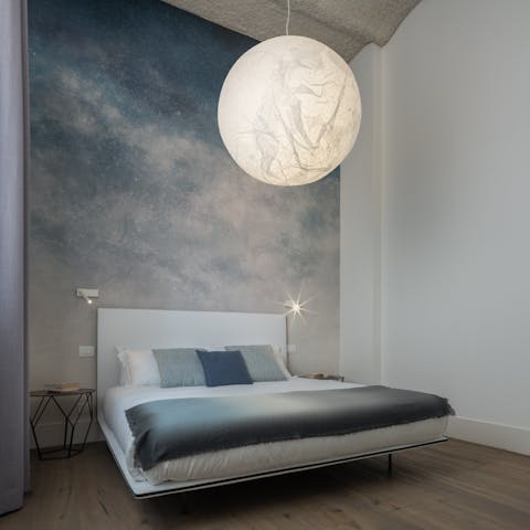 Drift off to sleep in the dreamy night-themed bedroom