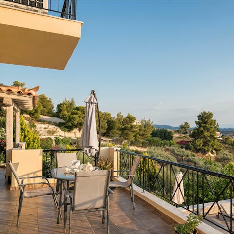 Tuck into breakfast on the sunny private balcony 