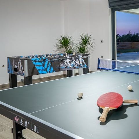 Play a game of table tennis in the games room