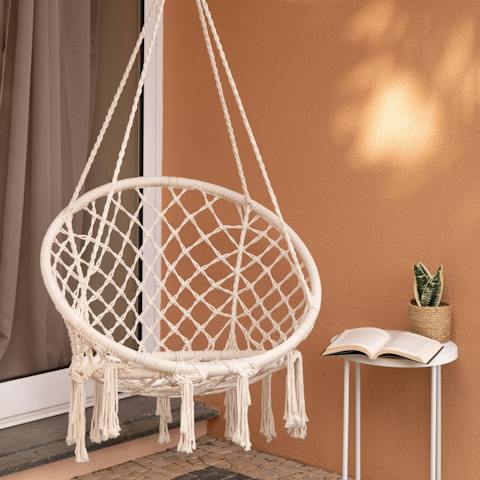 Find the macrame swinging chair and curl up with a holiday read