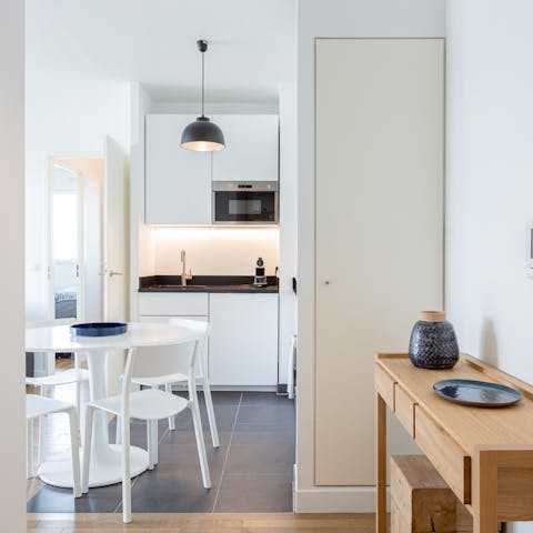 Fire up the coffee pod machine in the sleek kitchen area