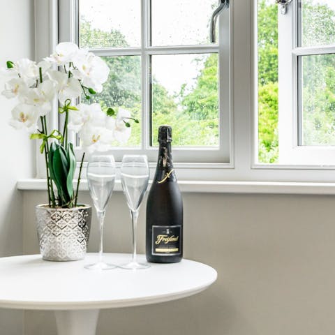 Relax and unwind with a glass of bubbly looking out over Minster Gardens