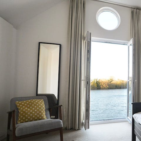 Wake up to glorious lake vistas each morning from the king-sized bedroom