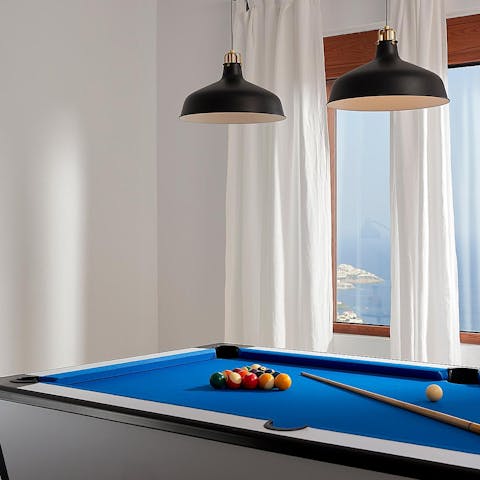 Try your hand at pool in the villa's games room