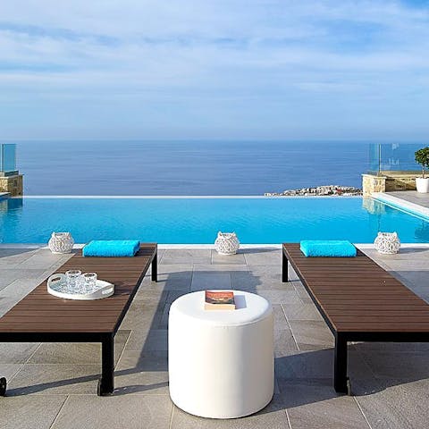 Soak in those gorgeous Cretan rays on poolside sun loungers
