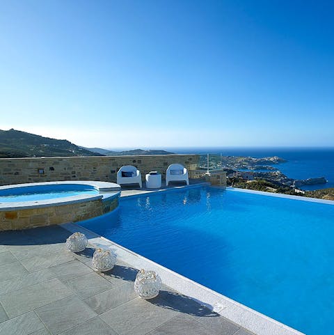 Splash around in the crystaline-blue waters of the private pool