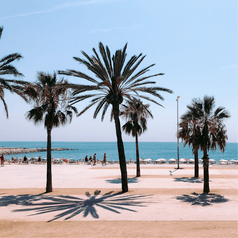 Enjoy a day of sun, sea and sand at bustling Barceloneta beach, half an hour from your home