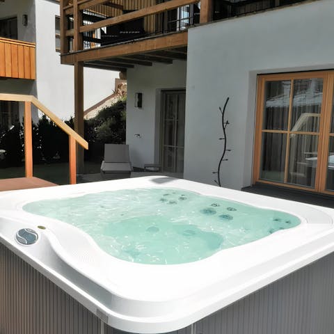 Treat yourself to an indulgent soak in the jacuzzi