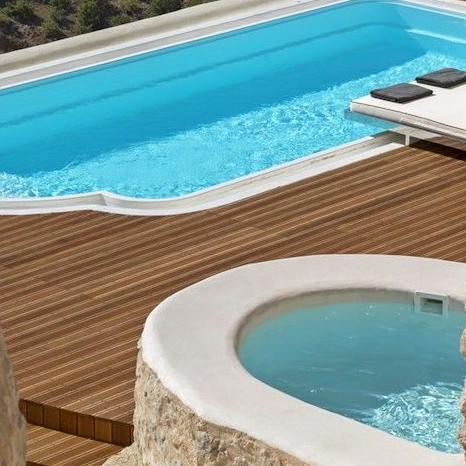 Take a dip in the inviting pool by day, and warm up in the stone hot tub by night