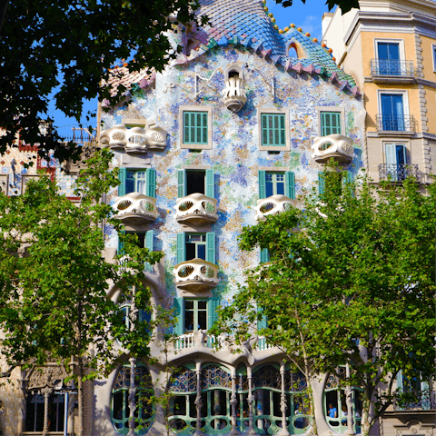 Hop on the metro for an eight-minute ride to the striking Casa Batlló