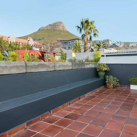 Admire the wonderful views of Table Mountain from the terrace