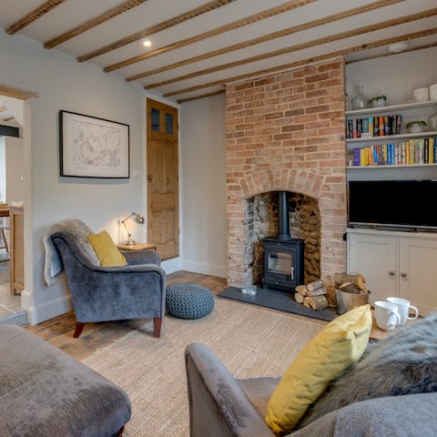 Get cosy in front of the wood-burning stove on chilly evenings