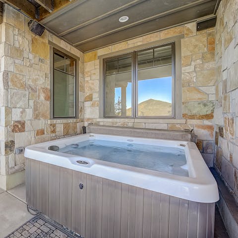 Sink into the bubbling hot tub at the end of a busy day skiing and adventuring