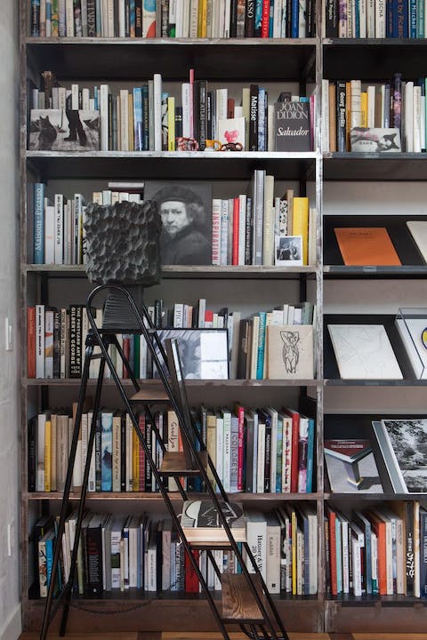 Peruse the shelves of this impressive art book library and pick out an afternoon read