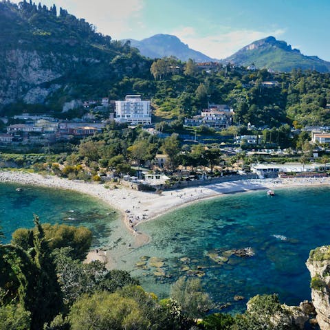 Take a drive up down to the hilltop town of Taormina