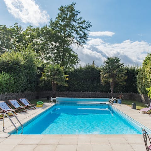 Take a dip in the heated swimming pool – perfect in summer months