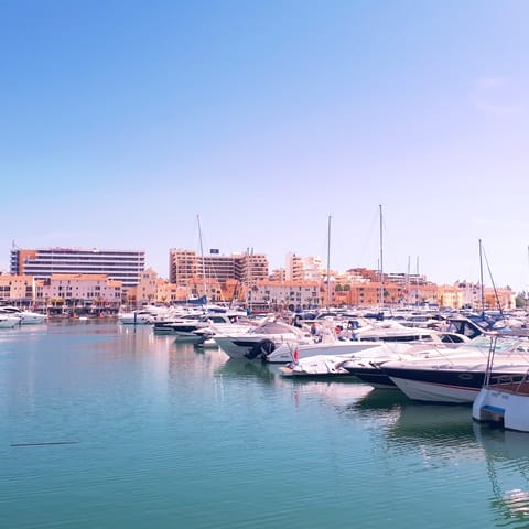 Stroll the marina or soak up the sun at the beach in picturesque Vilamoura