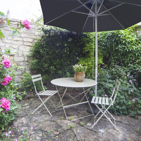 Relax in the pretty courtyard with some Somerset strawberries and cream