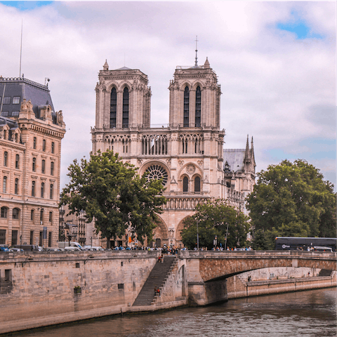 Take the twenty-minute stroll over to the medieval Notre Dame Cathedral on the Île de la Cité 