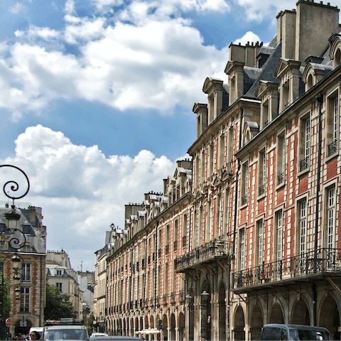 Stroll ten minutes to Place des Vosges for a picnic in the park 