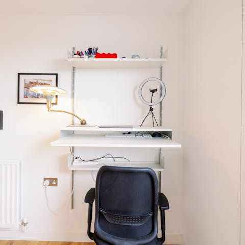 Catch up on work at the second bedroom's desk space