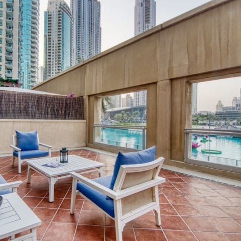 Watch the Dubai Fountain show from this home’s spacious terrace