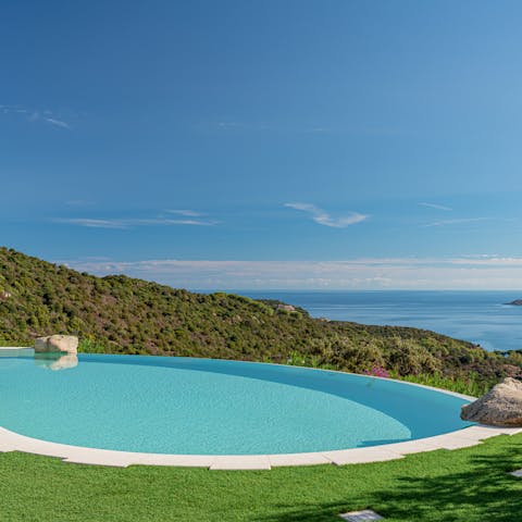 Cool off in the private infinity pool while taking in the view of the Gulf of Pevero