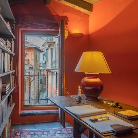 Get creative in the cosy study space, filled with books and a writing desk