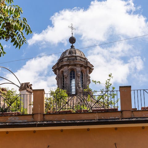 Enjoy an alfresco breakfast on your terrace balcony overlooking the dome of Chiesa di Santa Maria