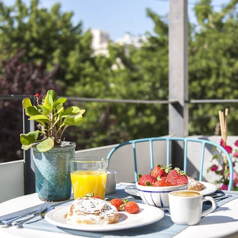 Enjoy an alfresco breakfast on the sunny private balcony