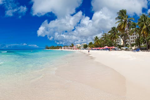 Stroll along the soft white sands of Dover Beach, seconds from your building