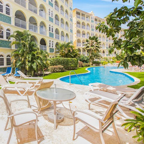 Enjoy an ice-cold drink on the patio before plunging into the communal pool