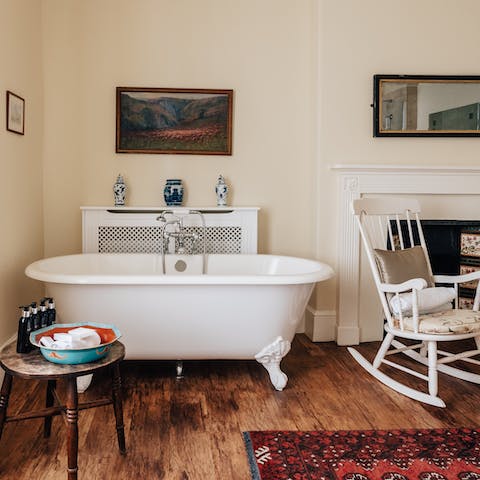 Enjoy a long soak in the freestanding bathtub