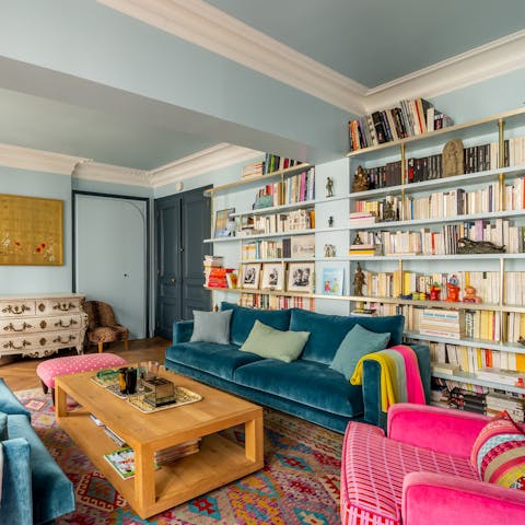 Pick a book from the library and unwind a colourful living room