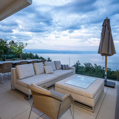 Lounge on the raised terrace and dine alfresco with perfect sea views