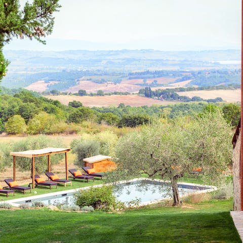 Enjoy breathtaking views of the surrounding landscape from the garden