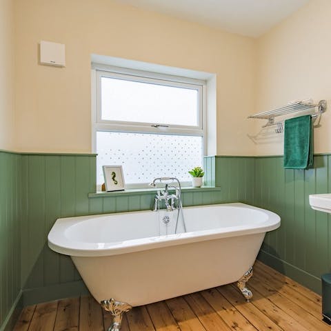Relax after a day of exploring Kent in the freestanding bathtub